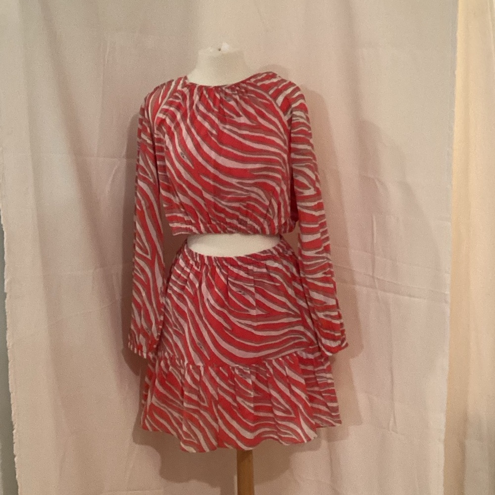 Michael Kori’s 2 piece zebra print cotton lawn cutout summer outfit.